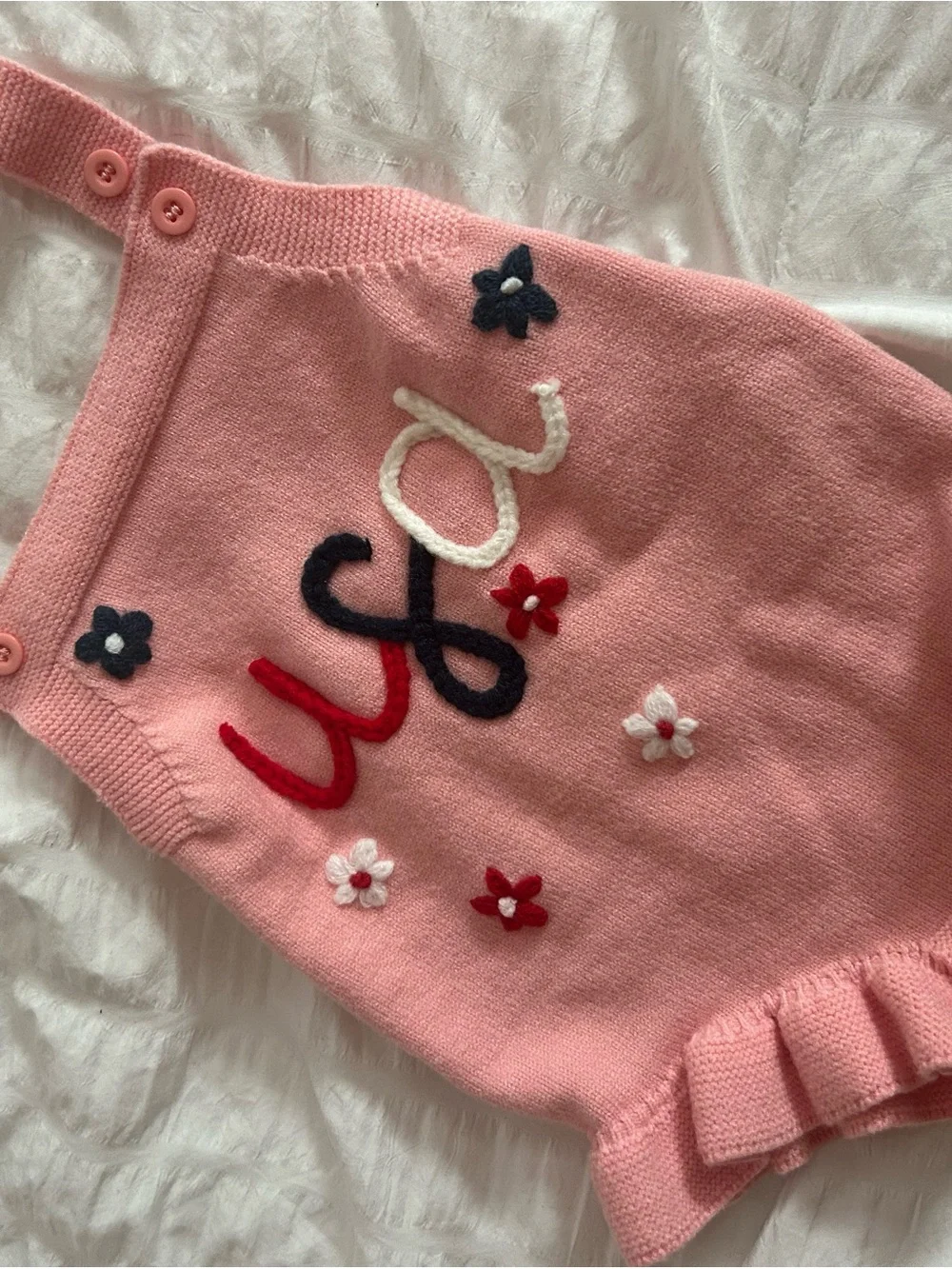 Baby Pink Knit One-Piece Romper with Floral Appliqué
